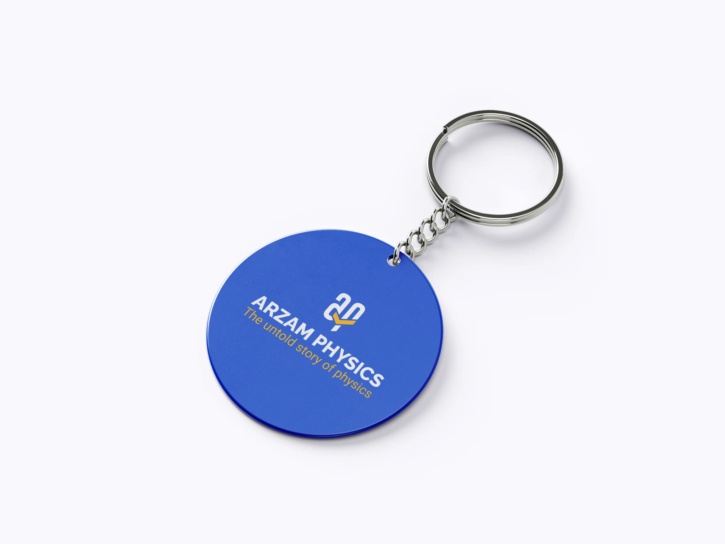 Circular blue keychain carrying the Arzam Physics mark